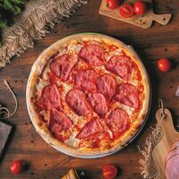 С ветчиной и сыром в Чили пицца