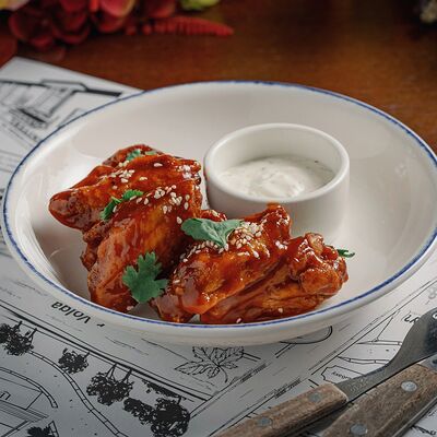 Жареные куриные крылья в Паб старый чемодан по цене 560 ₽