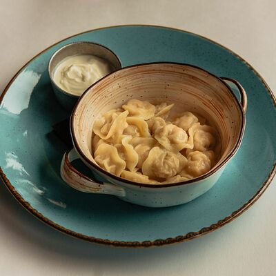 Пельмени со сметаной в Мацони по цене 190