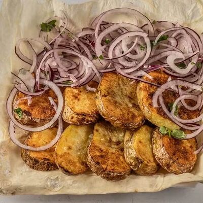 Картошка на мангале в Уголок вкуса по цене 390 ₽