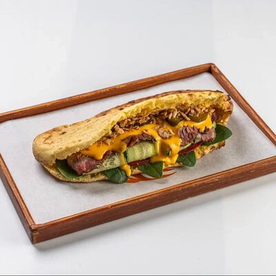 Пита с томленым брискетомв Миндаль по цене 1140 ₽