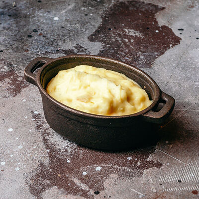 Картофельное пюре с пармезаном и печеным чесноком в Torro Grill по цене 750 ₽