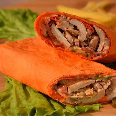 Шаурма Гигант с курицей в сырном лаваше в Мангал хаус по цене 615 ₽