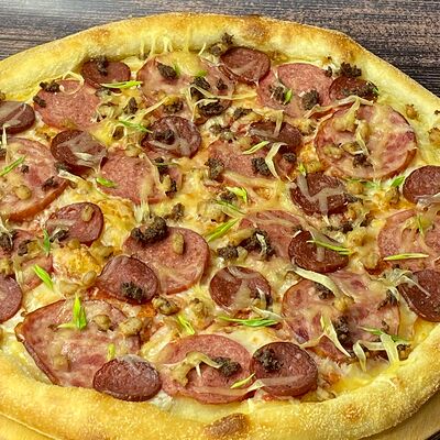 Пицца мясистая Тёплый ужин в Твоя удача по цене 650 ₽