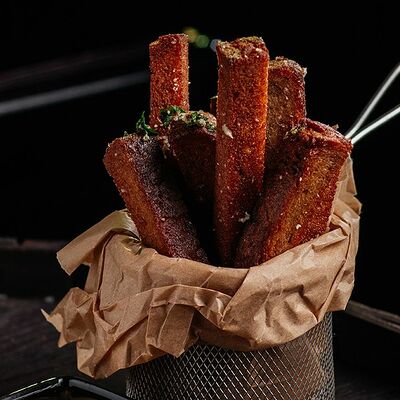 Гренки с сырным соусом, чесноком и зеленью в О`Briens по цене 350 ₽