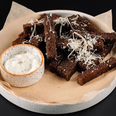 Гренки чесночные в РАХАТ по цене 255 ₽