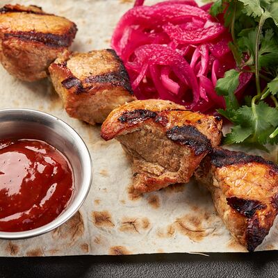 Шашлык из свинины в По Чесноку по цене 608 ₽