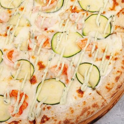 Пицца с креветкой и цукини и Трюфельным маслом в Наше место по цене 770 ₽