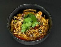 Яичная лапша с морепродуктами в соусе кимчи в Papaya