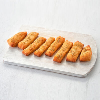 Ароматные хлебцы с чесноком в Domino Pizza по цене 109