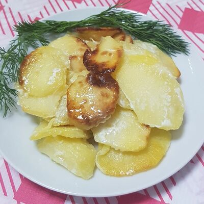 Запеченный картофель в соусе в Семейное по цене 123 ₽