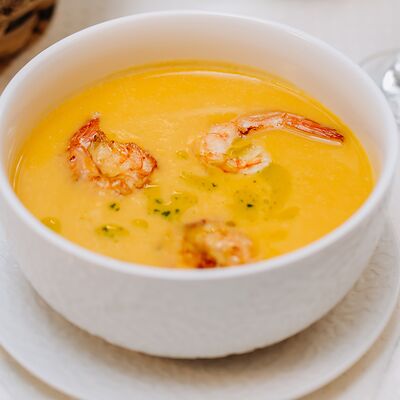 Тыквенный крем-суп с креветками в Grenka на Труда по цене 400 ₽