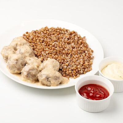 Фрикадельки с соусом и гречей в БлинОК по цене 765 ₽