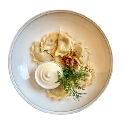 Вареники с картофелем и луком с сюрпризами в Breakfasteria по цене 530 ₽