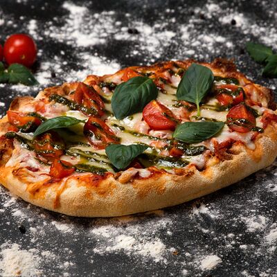 Пицца фирменная Маргарита в PIZZAZAVR по цене 790 ₽