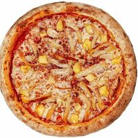 С ананасами и копченой курочкойв Dens Pizza