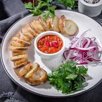 Молодой картофель с курдюком на углях в Арт-кафе Победа