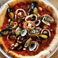 Пицца Фрутти ди марэ в Кастельсардо