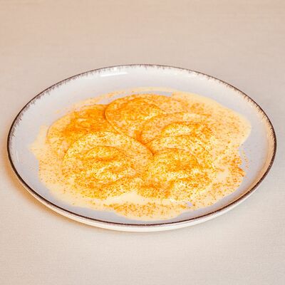 Равиоли с лимоном, рикоттой и пудрой из вяленых томатов в Беллуччи по цене 430