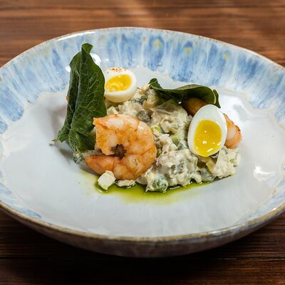 Оливье с копчёной треской в Трактир Колесо по цене 720 ₽