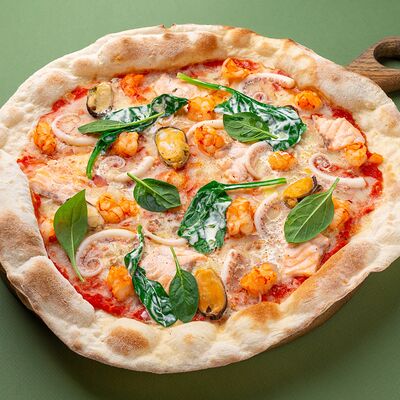 Пицца с морепродуктами в Osteria Mario по цене 990 ₽