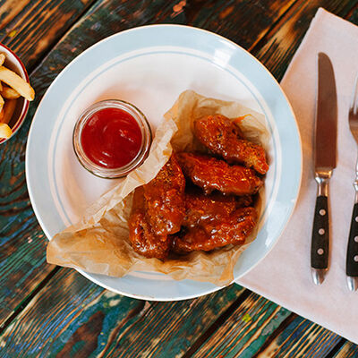 Куриные крылья в соусе чипотле в Крылышко или Ножка по цене 440 ₽