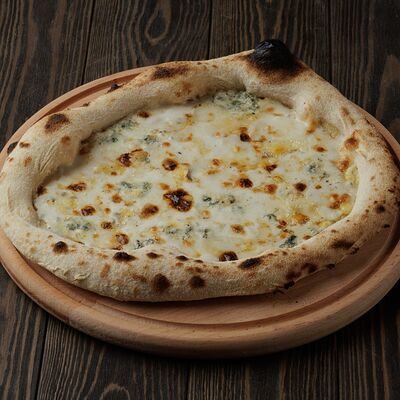 Пицца Четыре сыра в Mis по цене 862 ₽