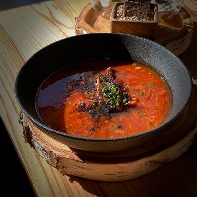 Борщ с уткой и копченой сметаной в Picasso по цене 900 ₽