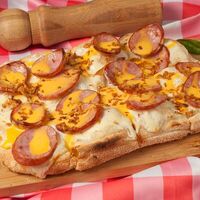 С краковской колбасой и соусом чеддер в Perotti Pizza