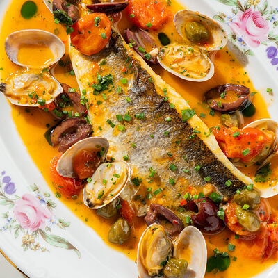 Сибас с каперсами и оливками в Nomad по цене 1550 ₽