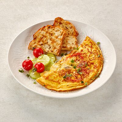 Омлет с сыром и ветчиной в Пармезан по цене 595 ₽