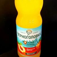 Черноголовка персик в Вулкан