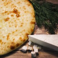 Пирог с осетинским сыром, моцареллой и зеленью в Гранд Пирог
