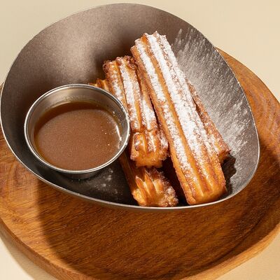 Чуррос с соленой карамелью в Lars Vegans по цене 280 ₽