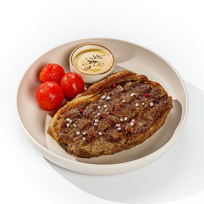 Стейк стриплойн Prime с томатами черрив The Brasserie по цене 1990 ₽