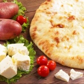 Осетинский пирог с курицей и картошкой в Осетинские пироги от Забавы по цене 1300 ₽