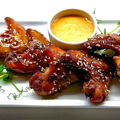 Крылья в медовом соусе в Алиби по цене 500 ₽