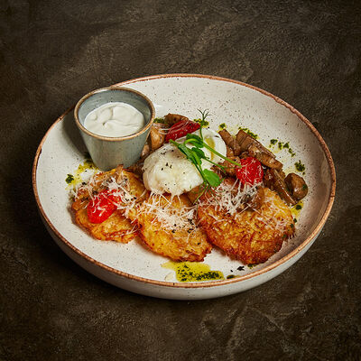 Драники с грибами и яйцом пашот в Корчма по цене 590 ₽