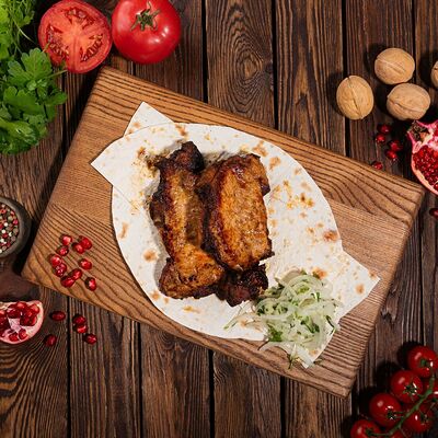 Шашлык из свиной корейки на кости в Кухня 91 по цене 516 ₽