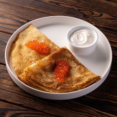 Блины со сметаной и икрой в Luciano по цене 790 ₽