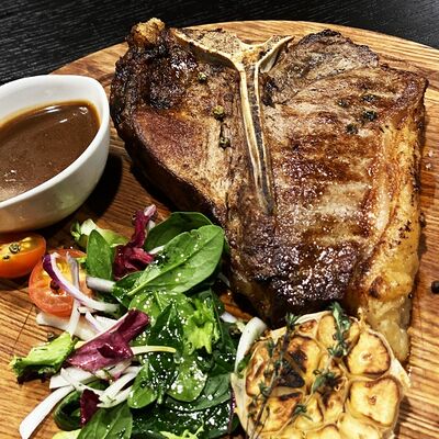 Стейк T-bone на кости в Irish Pub по цене 1440 ₽