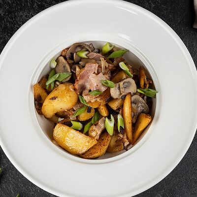 Картофель Айдахо с беконом и грибами в Пицца и Паста по цене 790 ₽