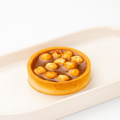 Тарт с карамелью и фундуком в Болтушка кулинария-кондитерская по цене 250 ₽