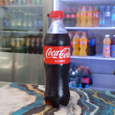 Coca-Cola в Чайхана 24 Халяль по цене 220 ₽