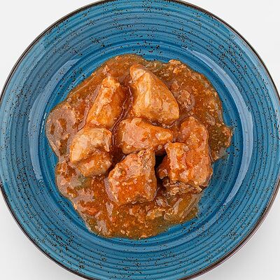 Свинина, тушенная в томатном соусе в Вилка Ложка по цене 258 ₽