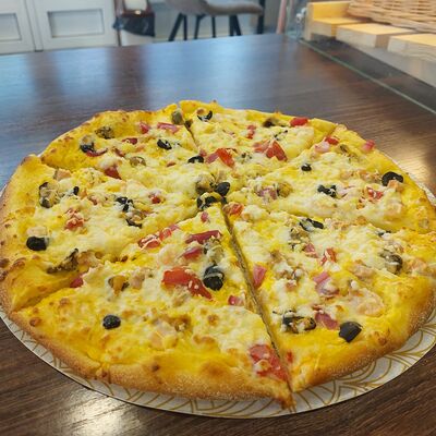 Пицца Морской коктейль в Пекарня кондитерская Мука по цене 750 ₽