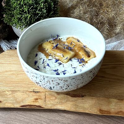 Каша рисовая на кокосовом молоке с бананом в Про Булки кафе-пекарня по цене 260 ₽