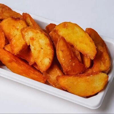 Картофельные долькив МОНСТА Бургерная по цене 230 ₽