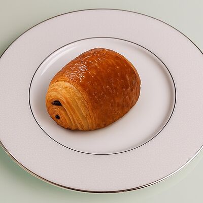 Pain au chocolat в NIQA Patisserie & Cafe по цене 420 ₽