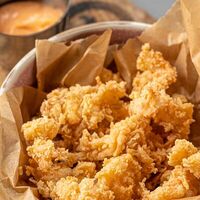 Куриный попкорн в Барслона